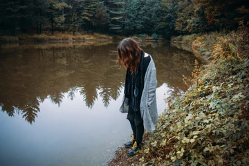 girl beside a lake