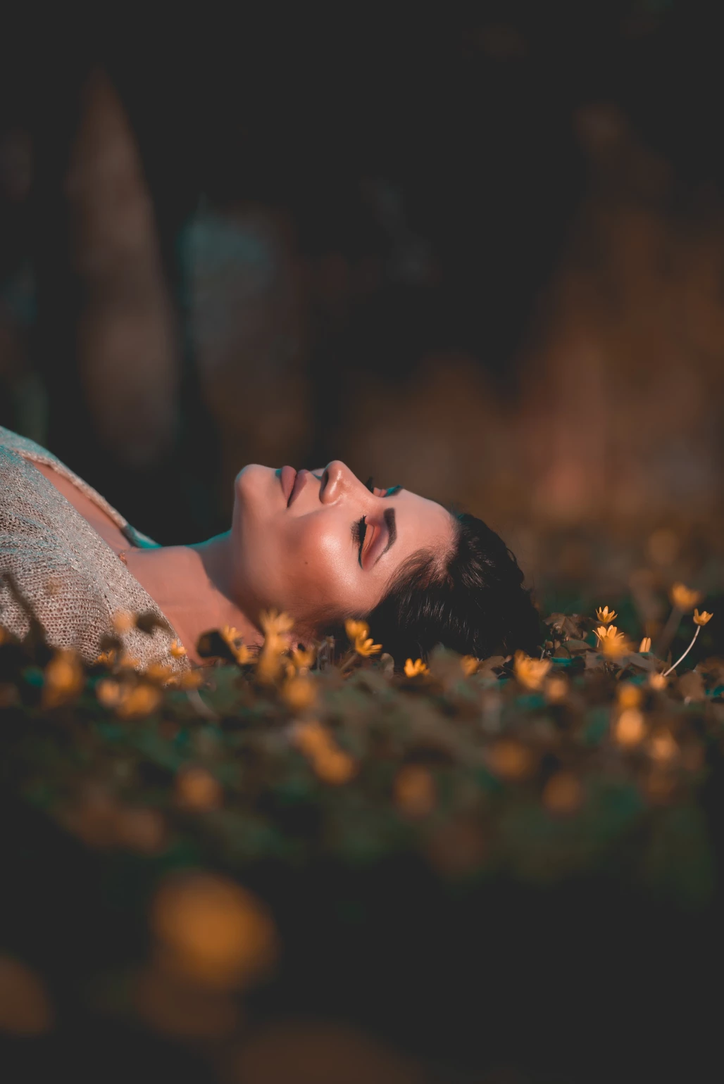 girl lying on flowers