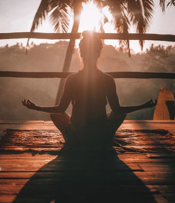 yoga girl under sunset